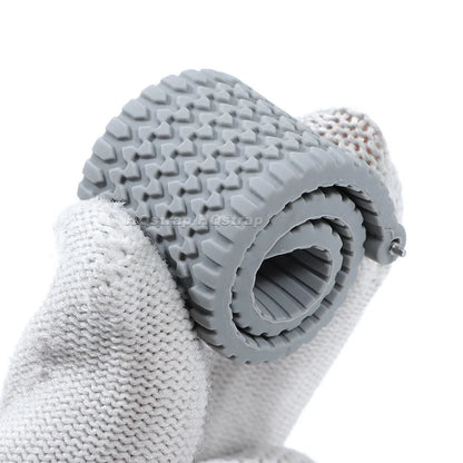 Garmin Tread Pattern Silicone Band — rolled to show flexibility