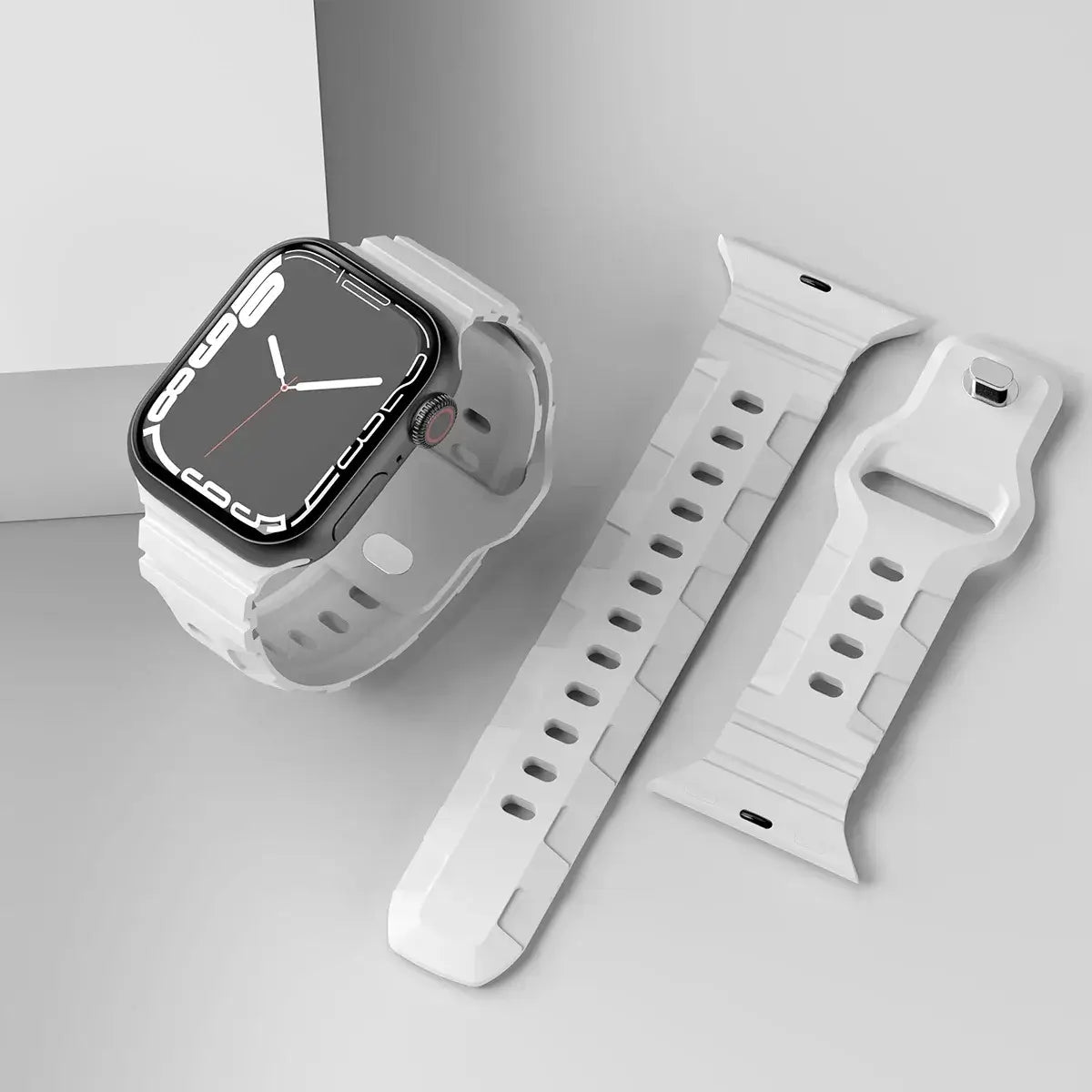 White ribbed silicone Apple Watch band with pin fastening.