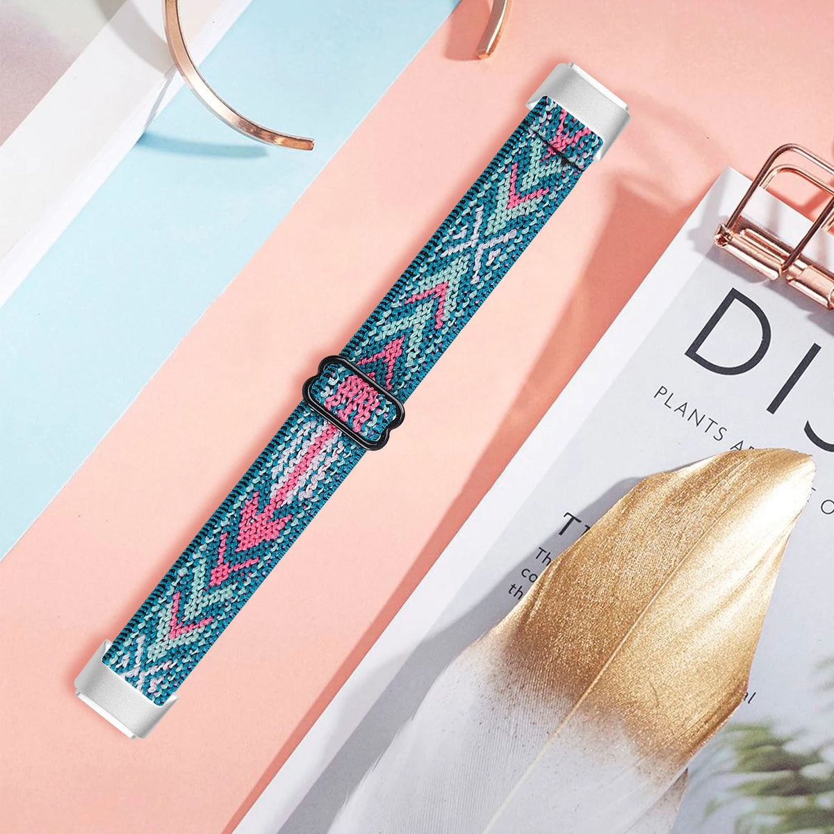Fitbit Luxe Adjustable Stretch Nylon Band - Teal and pink chevron strap laid flat