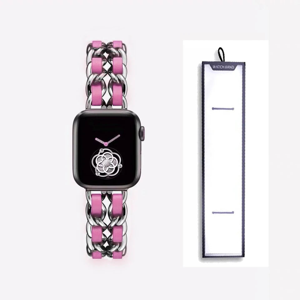 Silver chain bracelet with hot pink accents, shown beside packaging for Apple Watch