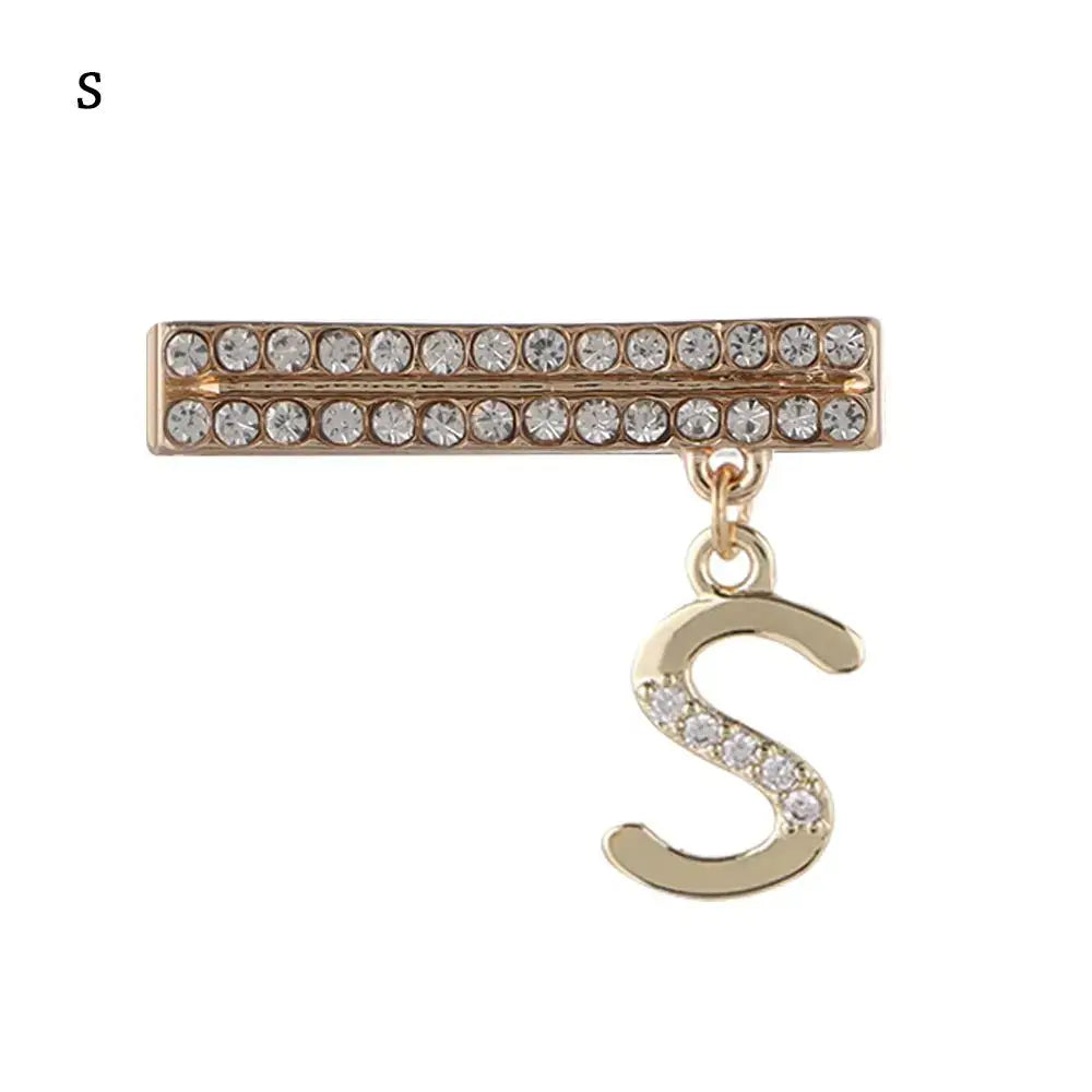 Decorative gold letter charm "S" with rhinestones for Apple Watch band enhancement.