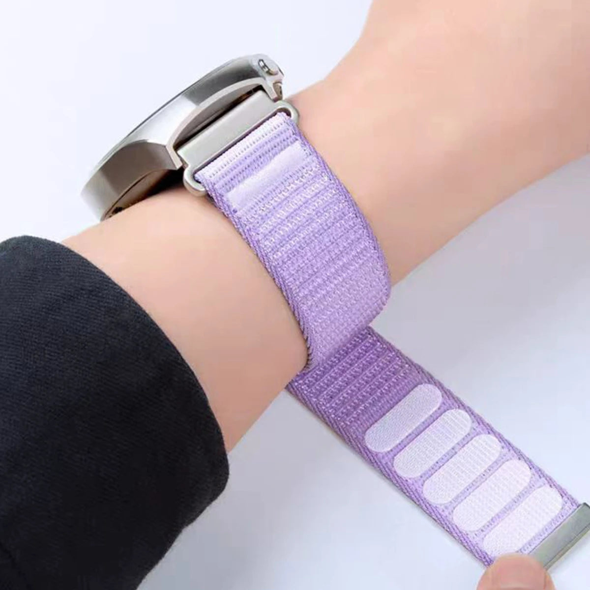 OnePlus Smartwatch Nylon Band Adjustable Velcro Sport Strap Bracelet in lavender color on a wrist.