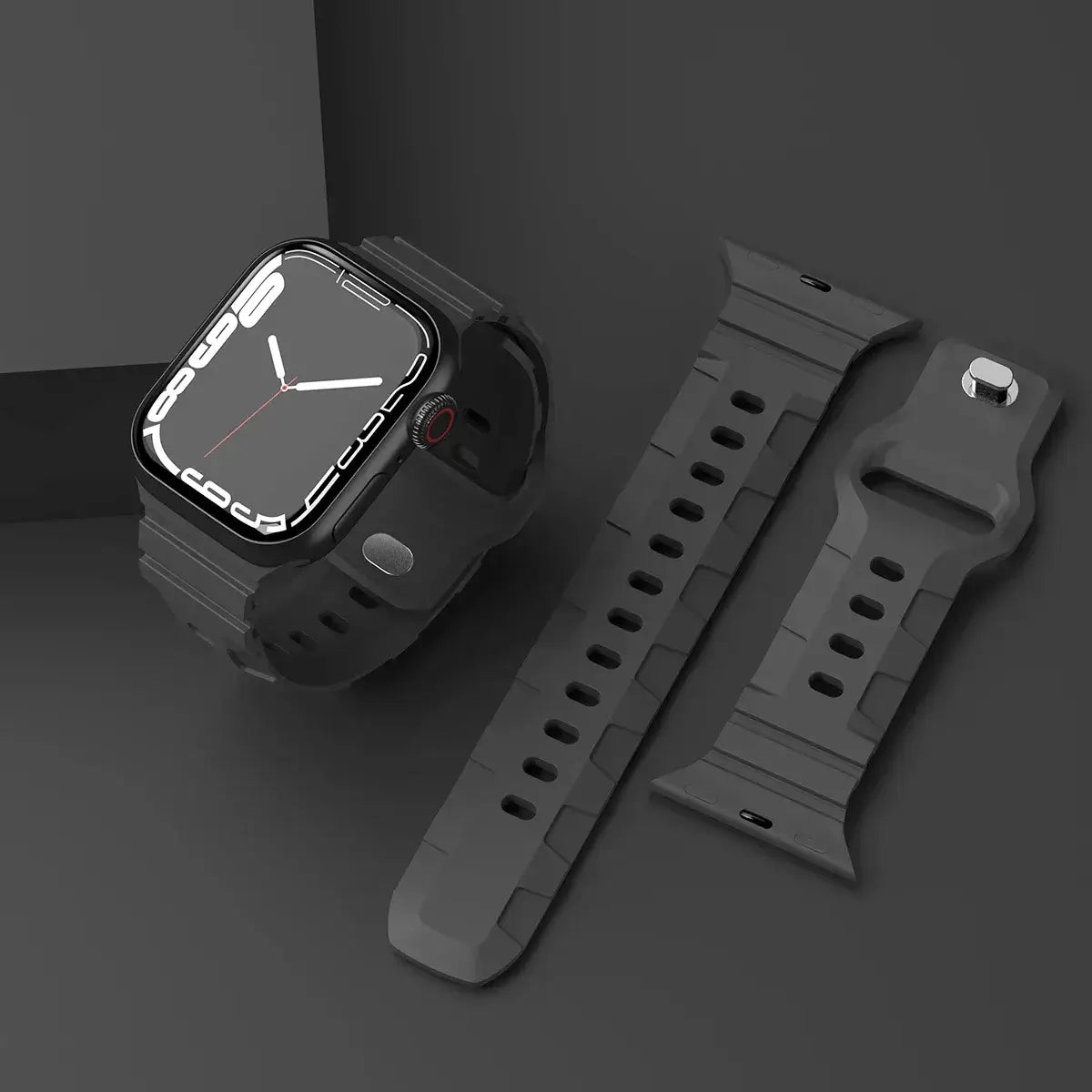 Black ribbed silicone Apple Watch band with pin fastening.