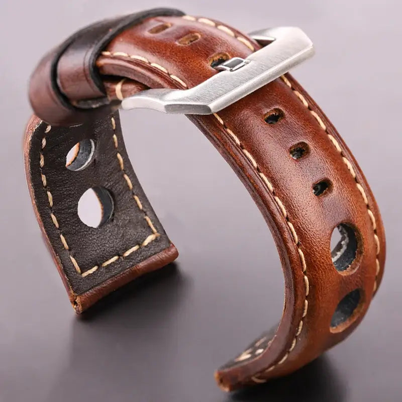 Brown rally leather band showing large round cutouts