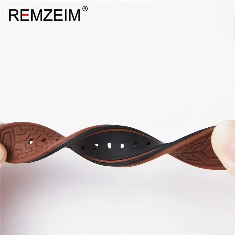 Two-tone silicone strap twisted to show flexibility