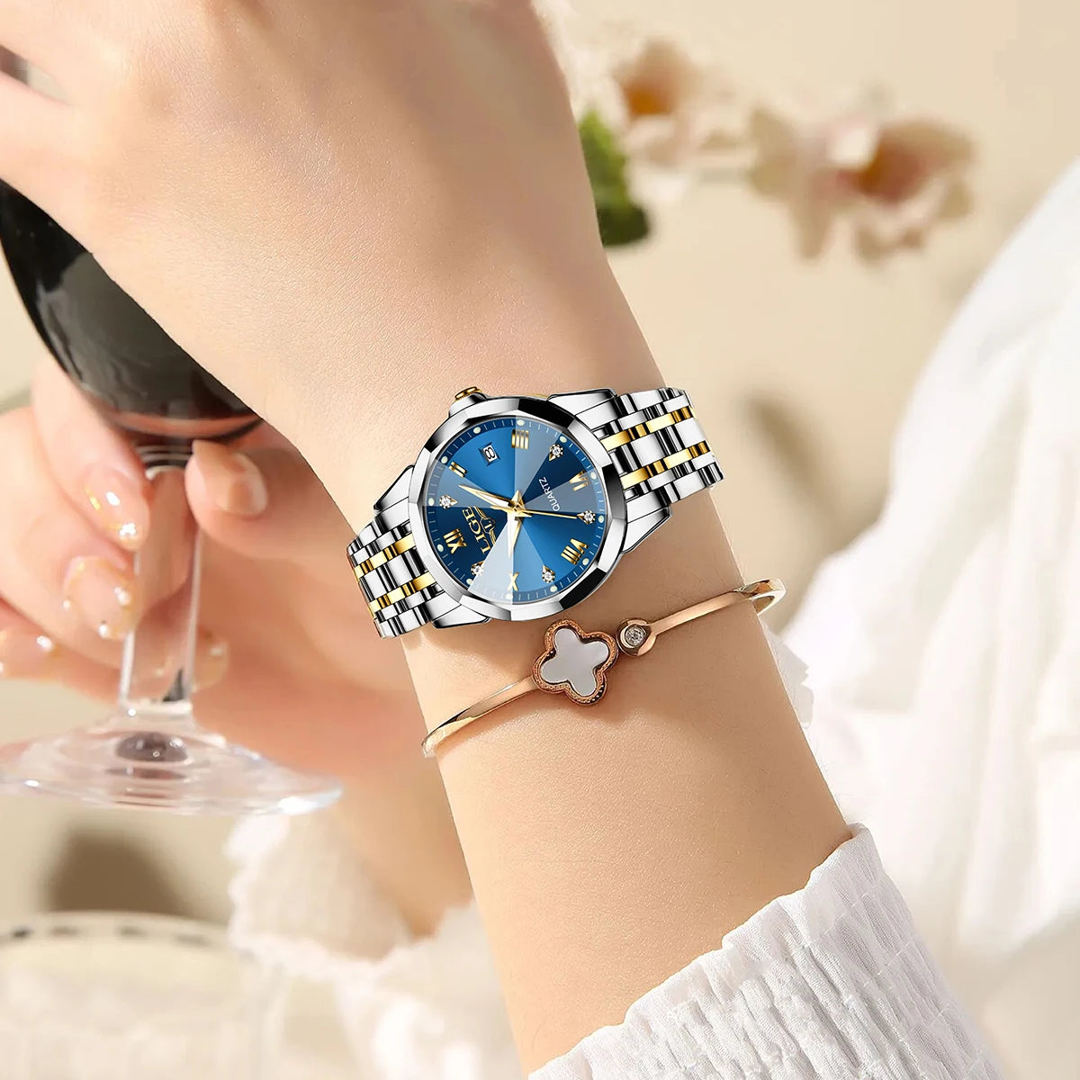 Women's 25mm Sunburst Dial Quartz Bracelet Watch — Two-tone bracelet watch worn on wrist