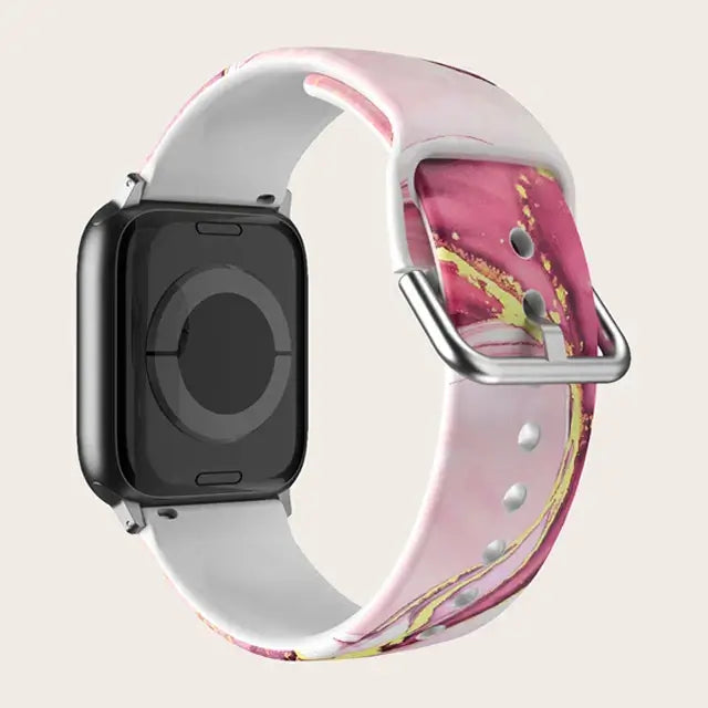 Pink Marble Apple Watch band with buckle and adjustment holes.