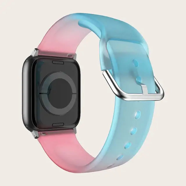 Pink / Blue Gradient Apple Watch band with buckle and adjustment holes.