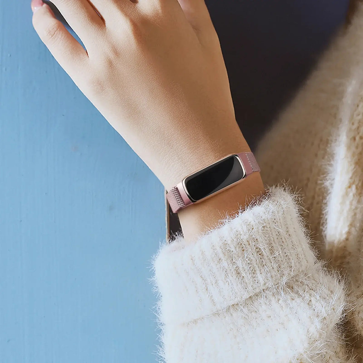 Fitbit Luxe Magnetic Stainless Steel Mesh Band - Rose pink band worn on wrist