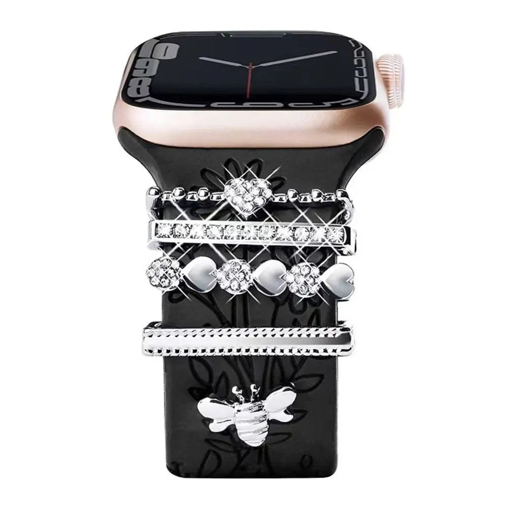 Decorative metal charms on an Apple Watch band, adding style and elegance with unique designs and durability.