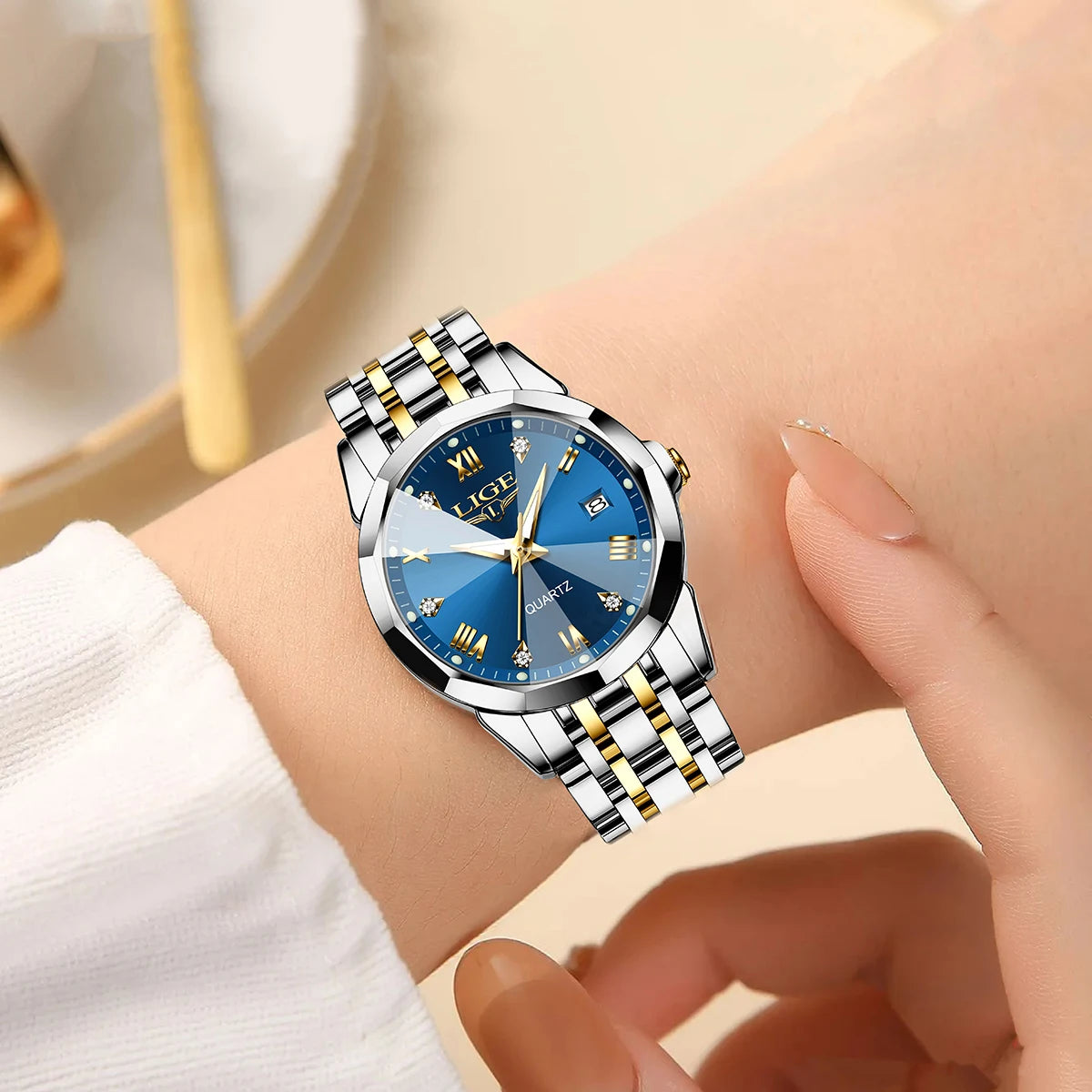 Women's 25mm Sunburst Dial Quartz Bracelet Watch — Blue dial watch worn on wrist