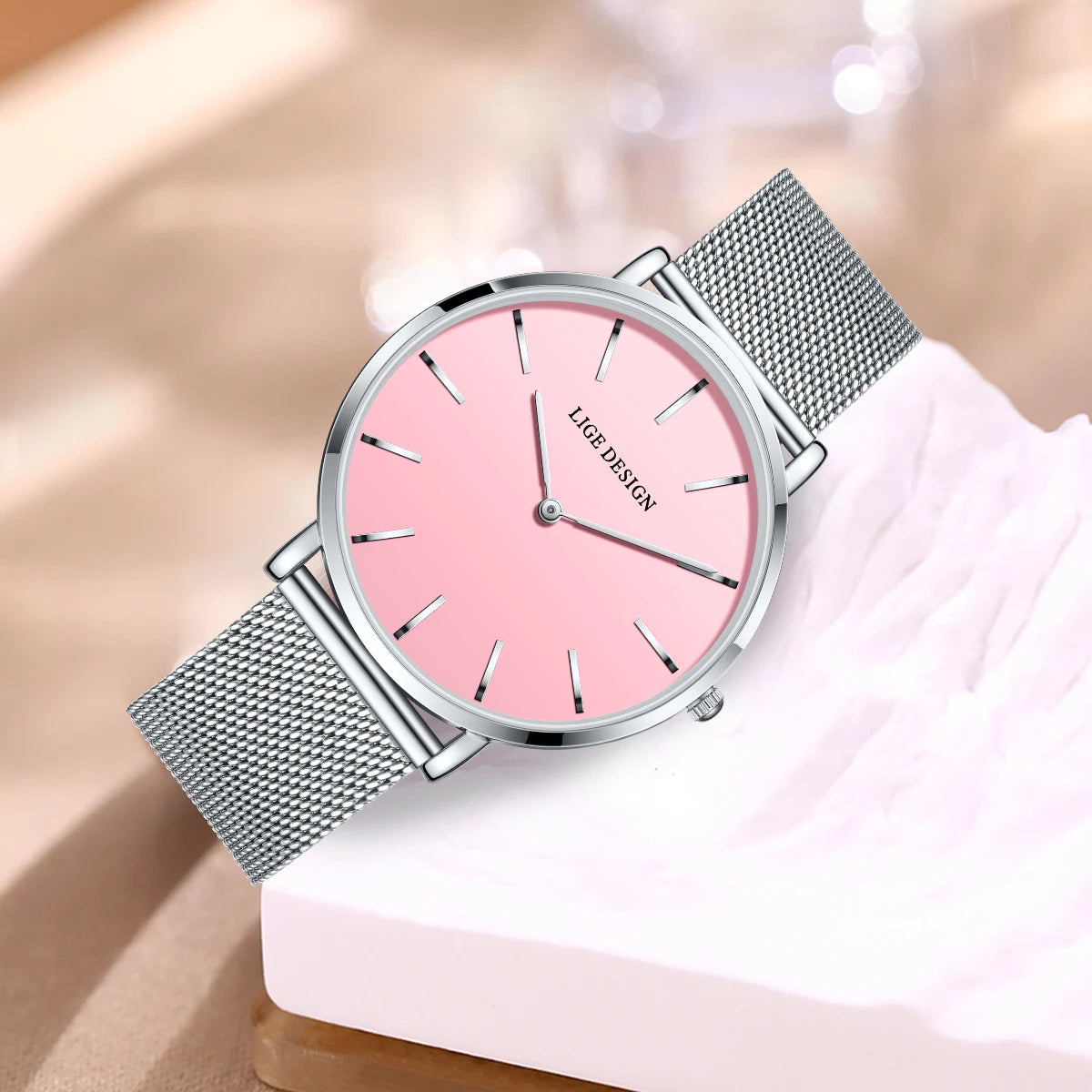 Women's Minimalist Quartz Watch with Stainless Steel Mesh Band — Silver-tone mesh and pink dial close-up