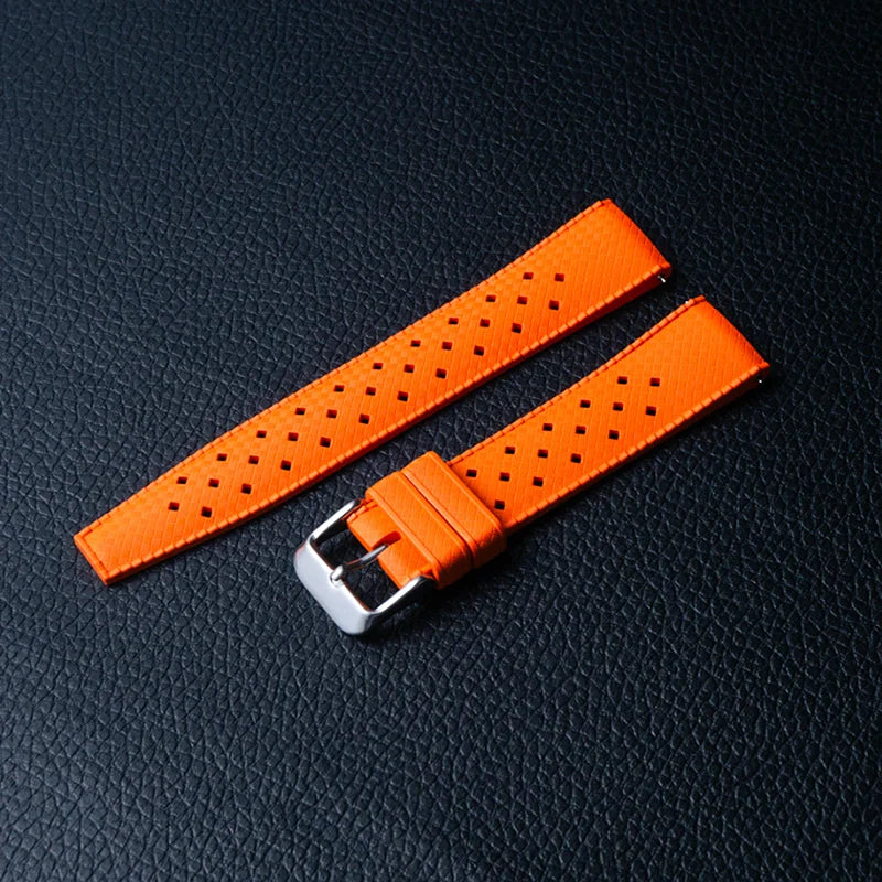 Orange tropic-style perforated rubber strap with silver buckle