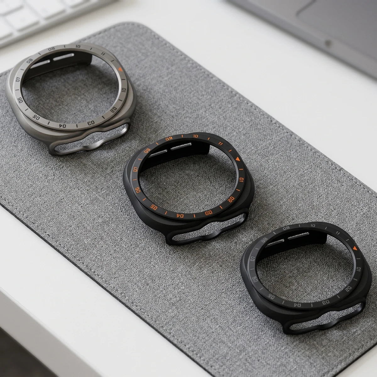 Samsung Galaxy PC Hollow Watch Band - Ultra/Ultra2 Glass Case displayed with three different sizes on a gray surface.