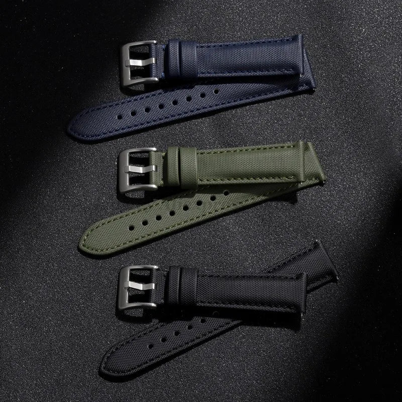 OnePlus Smartwatch Nylon Quick Release Sailcloth Watch Band Strap in navy, green, and black colors on a dark surface.