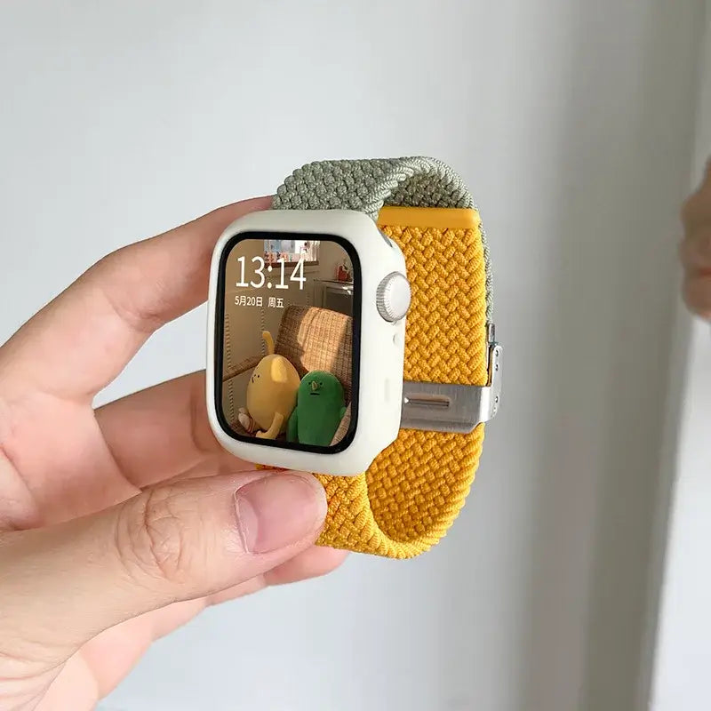 Olive and yellow woven Apple Watch band with white case