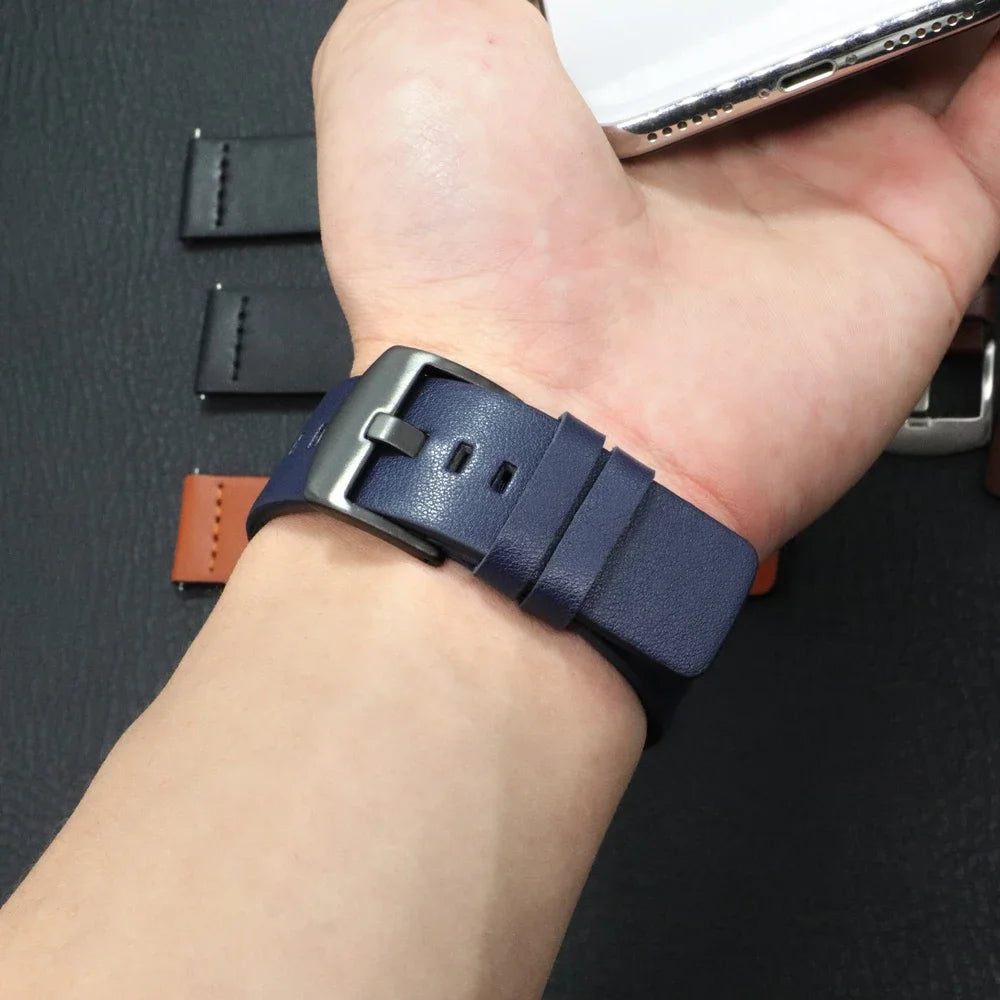 Garmin QuickFit Classic Leather Pin-Buckle Band navy leather strap shown on a wrist