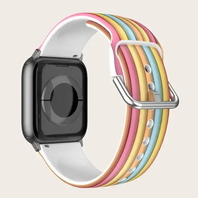 Pastel Stripes Apple Watch band with buckle and adjustment holes.