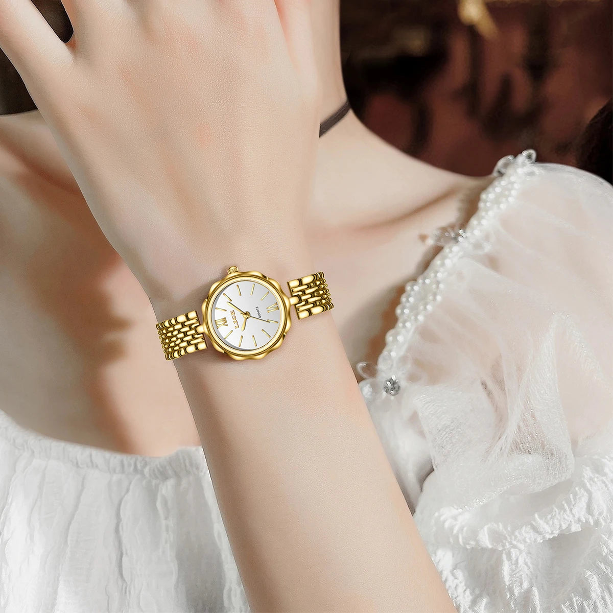 Women's Roman Dial Link Bracelet Quartz Watch — Gold-tone watch styled with blouse — BandsCo Straps