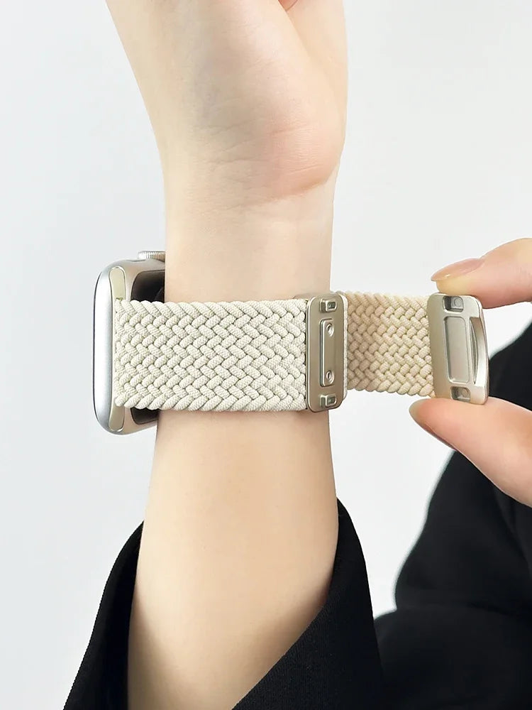 Adjustable hook clasp being fastened on a wrist for Apple Watch