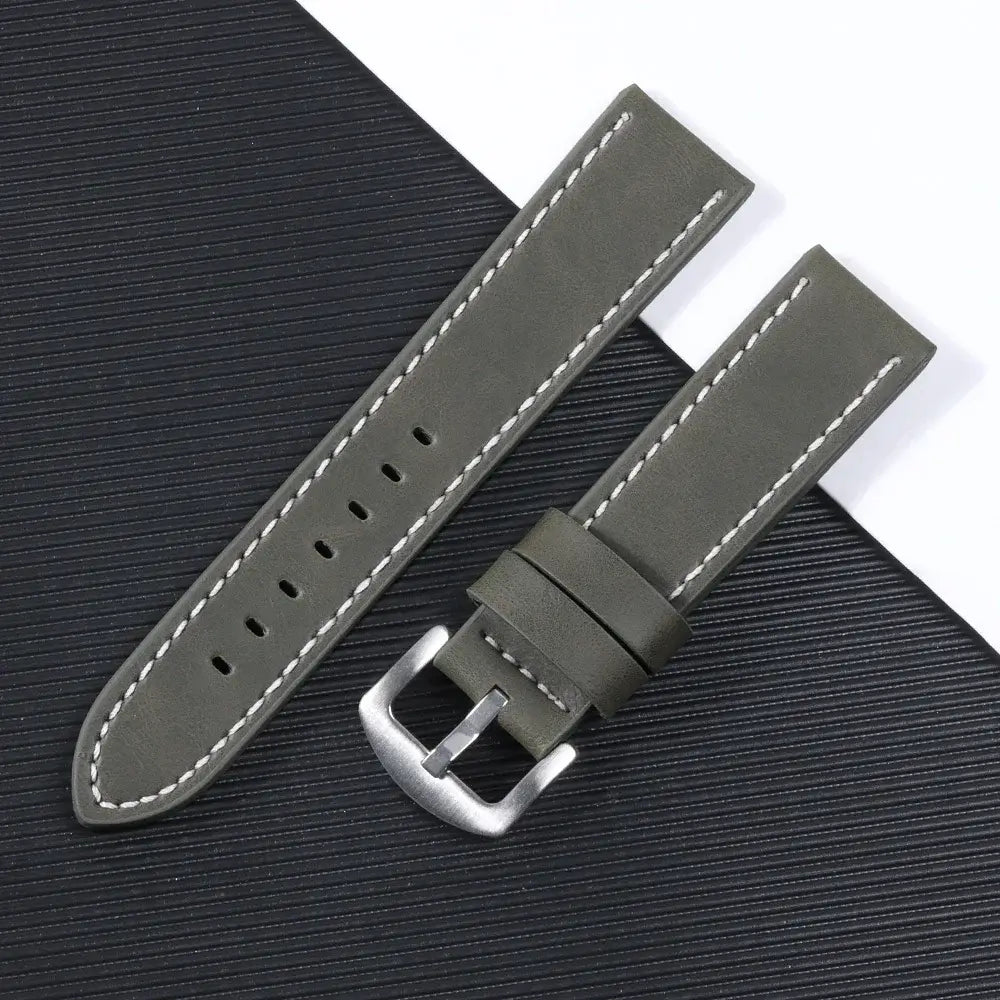 Gray leather strap with white stitching