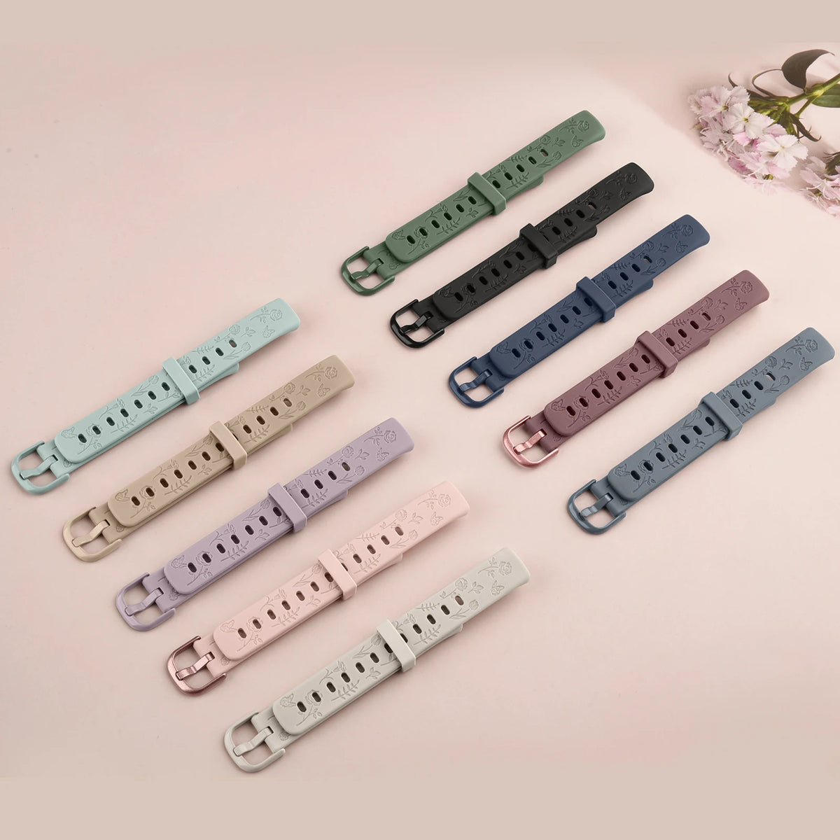Fitbit Luxe Floral-Engraved TPU Band - Engraved straps laid flat