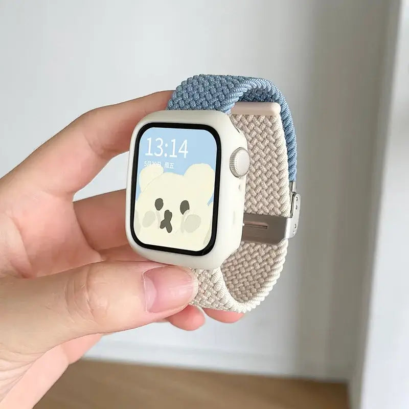 Light blue and beige woven Apple Watch band with white case