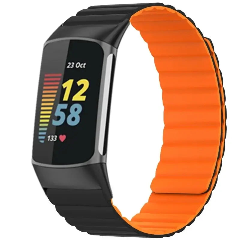 Fitbit Charge 5 & 6 Magnetic Silicone Wrap Band black and orange ribbed band shown on a tracker