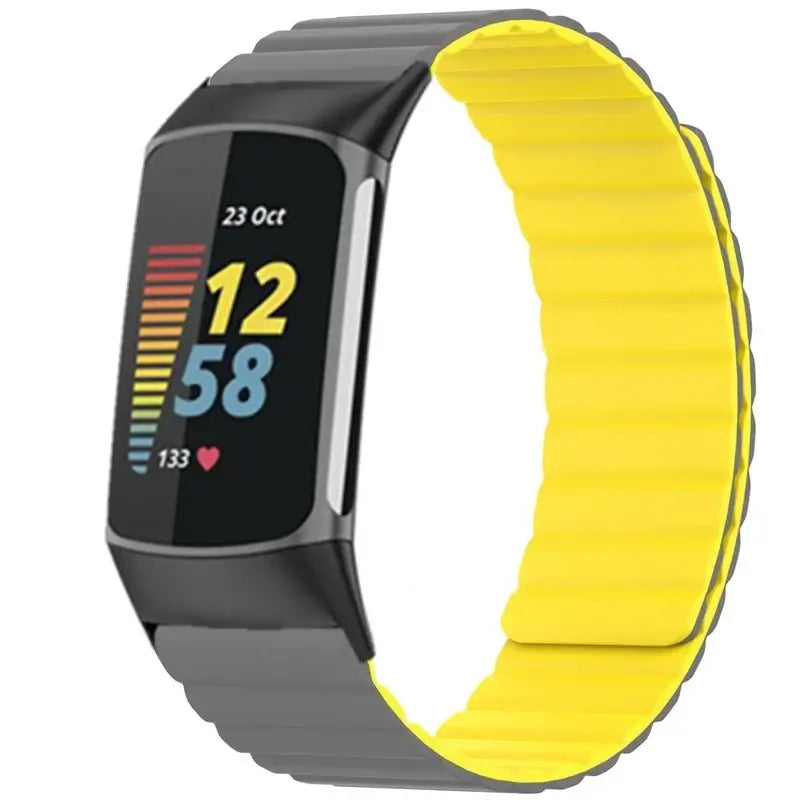 Fitbit Charge 5 & 6 Magnetic Silicone Wrap Band gray and yellow ribbed band shown on a tracker