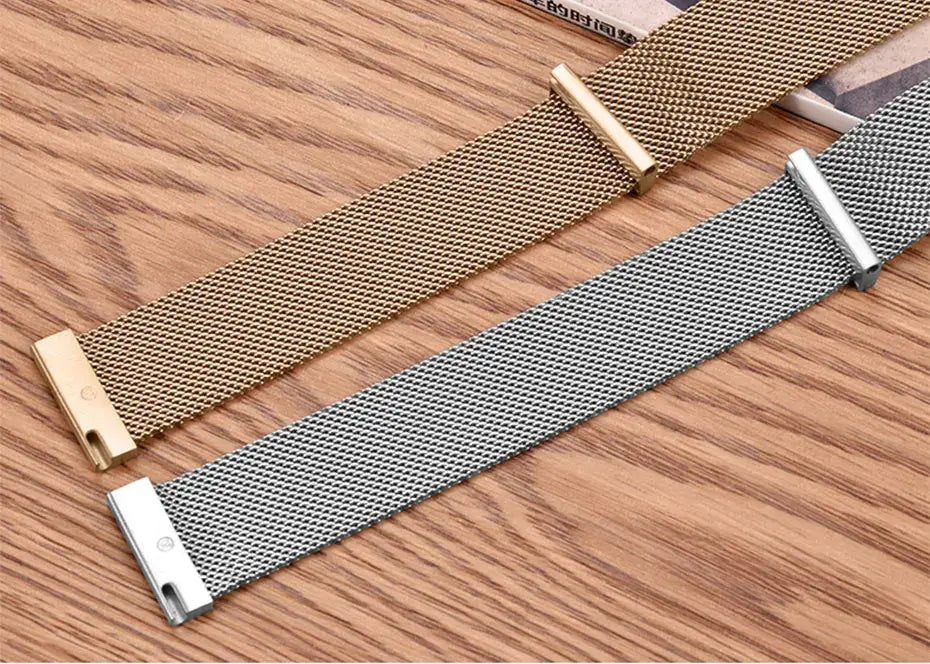 Gold-tone and silver mesh straps close-up
