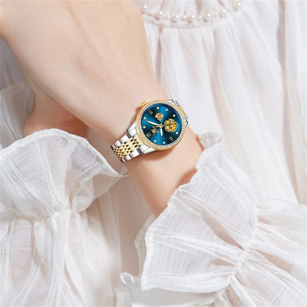 Women's Floral Openwork Automatic Bracelet Watch — Blue floral watch worn on wrist — BandsCo Straps