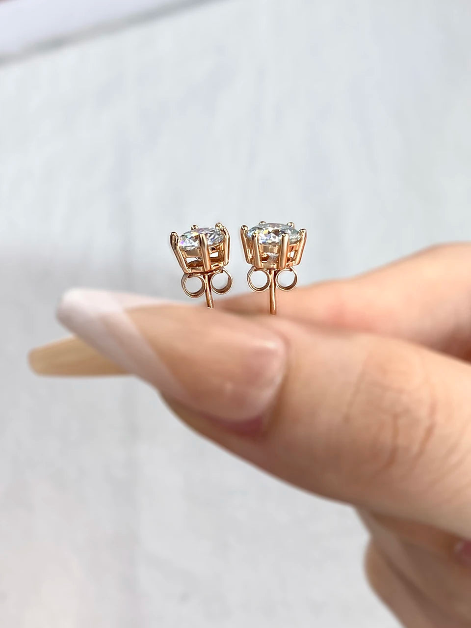 Six-Prong Moissanite Stud Earrings in Sterling Silver - rose gold-tone baskets and backs