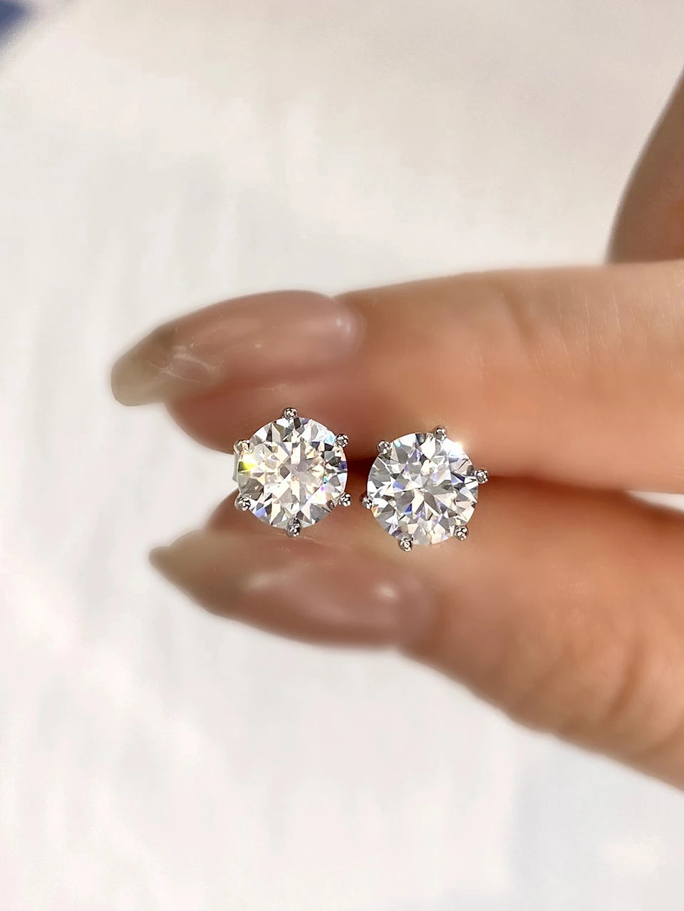 Six-Prong Moissanite Stud Earrings in Sterling Silver - silver close-up