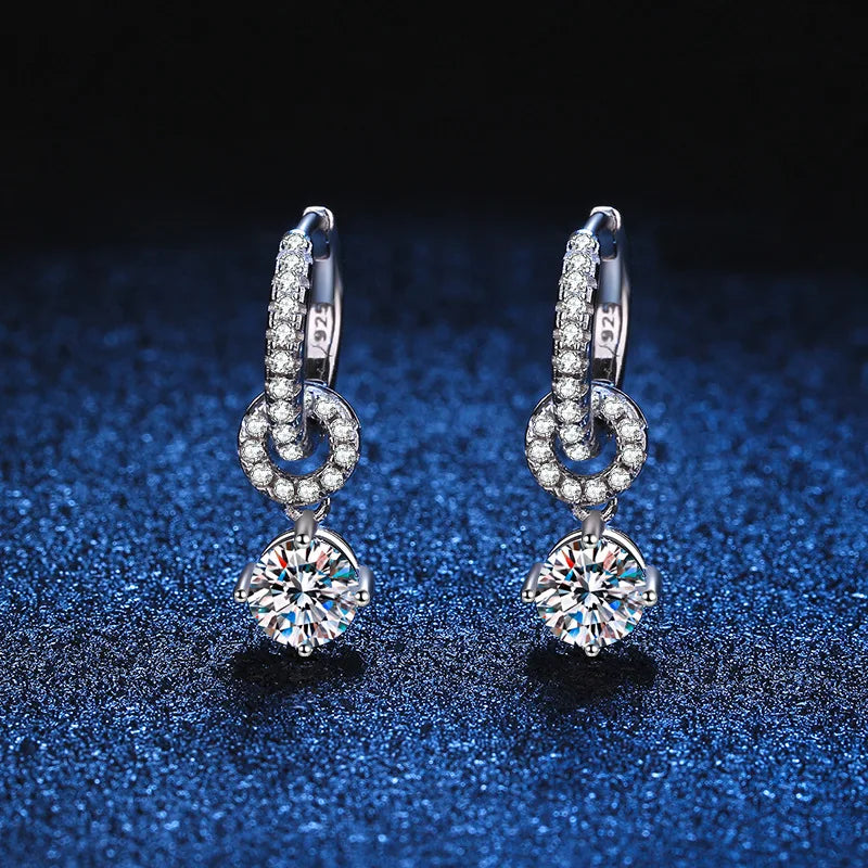 Moissanite Linked Circle Drop Earrings in Sterling Silver — Pair on blue fabric