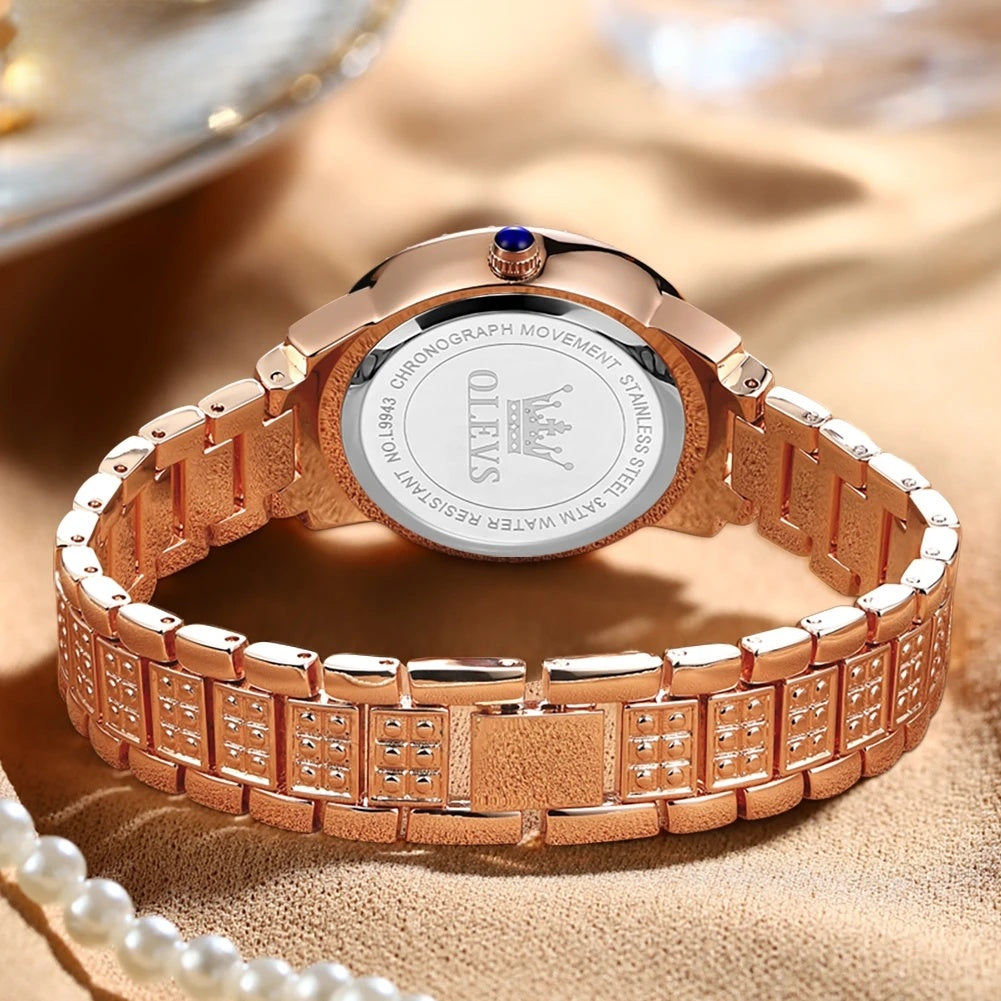 Women's Rose Gold-Tone Crystal Roman Numeral Watch — Case back and bracelet clasp
