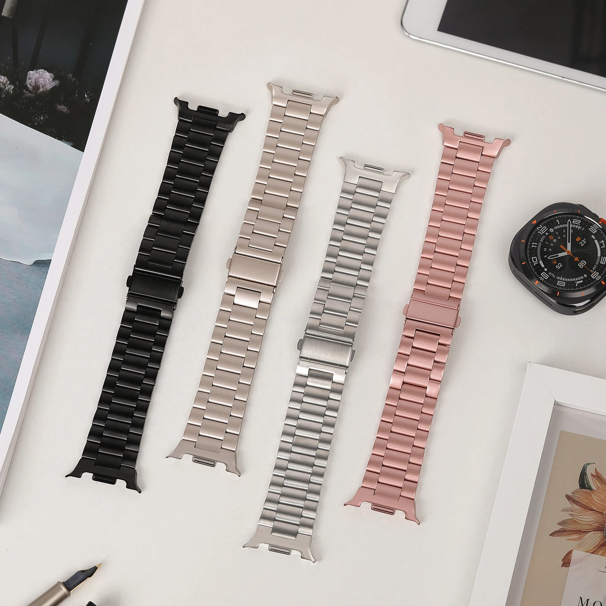 Four steel bracelet finishes laid flat