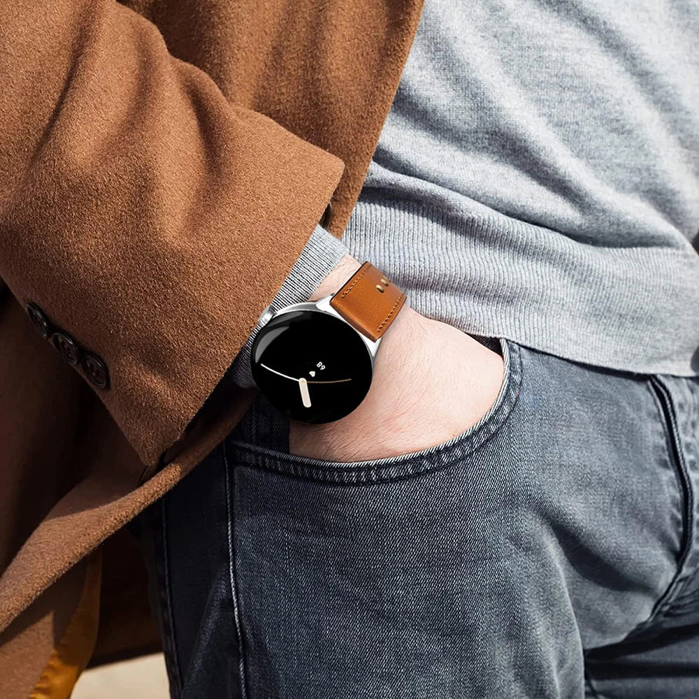 Tan leather Pixel Watch band worn on wrist