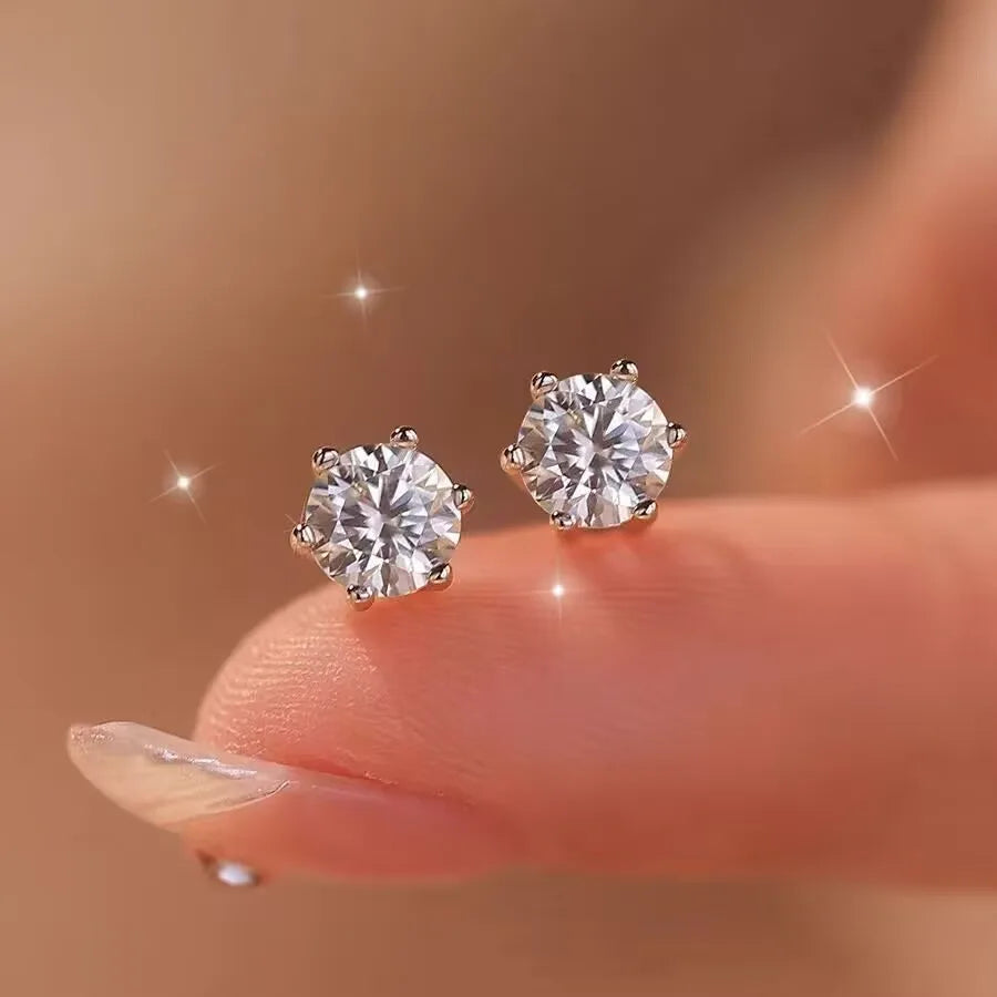 Moissanite Stud Earrings in Solitaire & Halo Silver Settings — Shown on hand