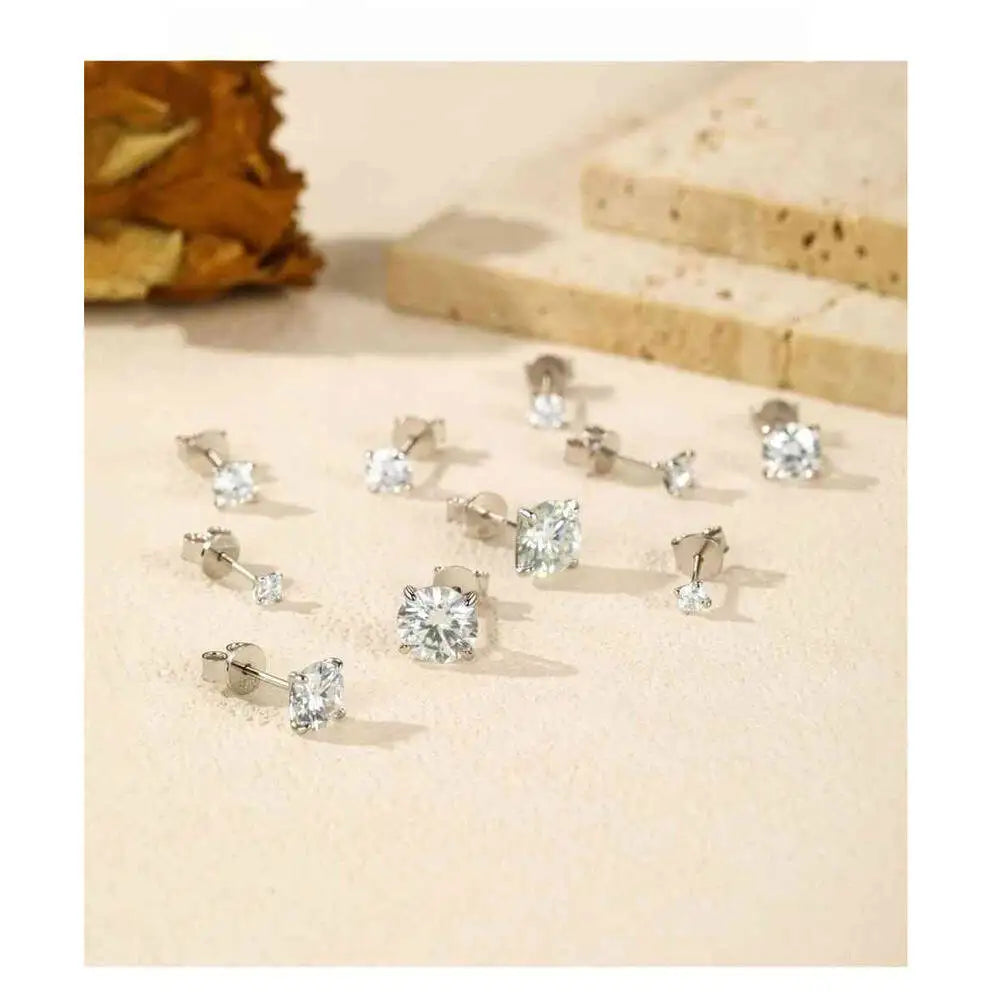Four-Prong Moissanite Solitaire Stud Earrings in Silver — Size assortment on display