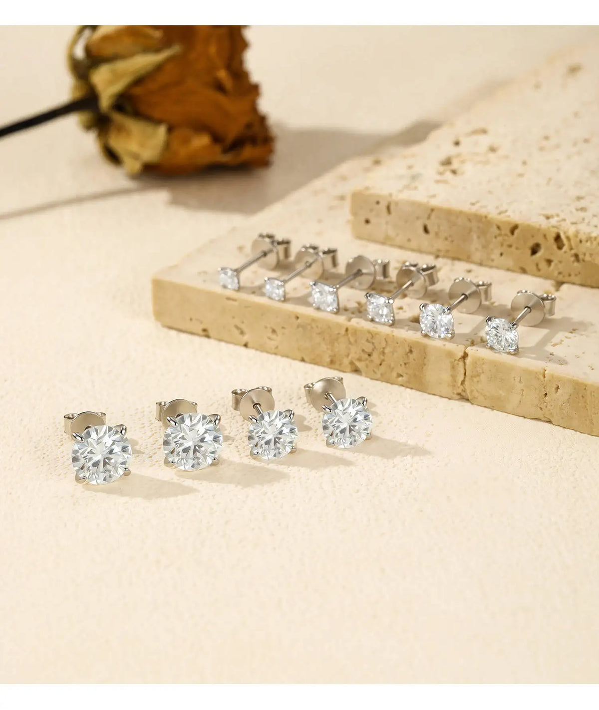 Four-Prong Moissanite Solitaire Stud Earrings in Silver — Size comparison