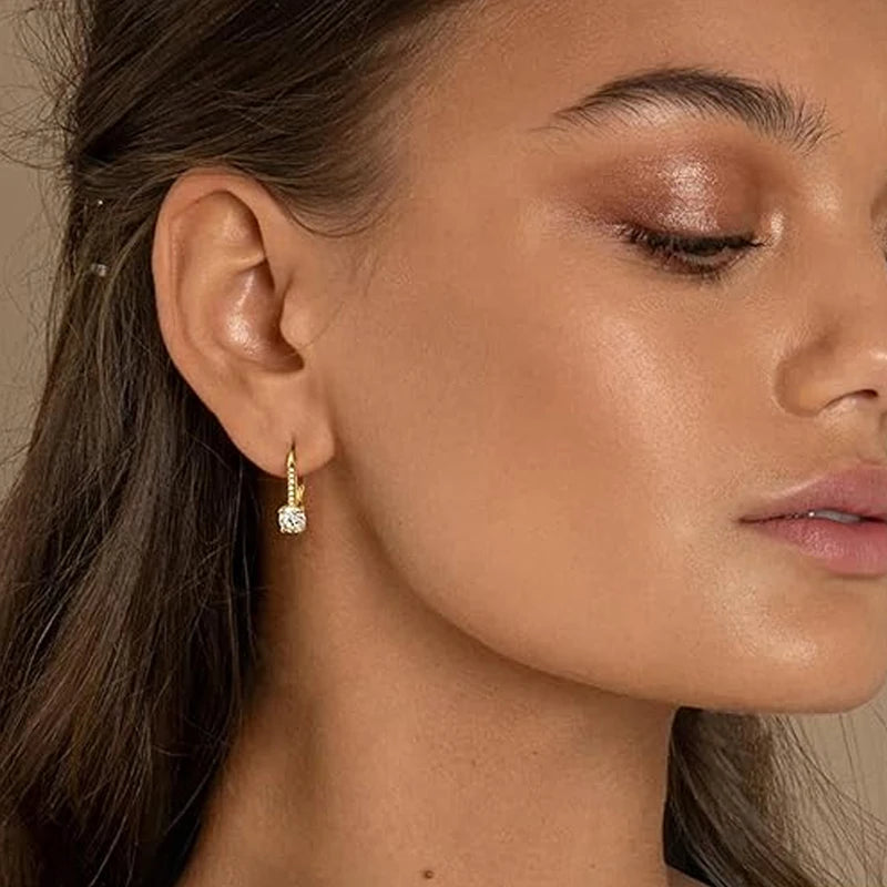 Moissanite Leverback Drop Earrings in Sterling Silver — Worn on ear