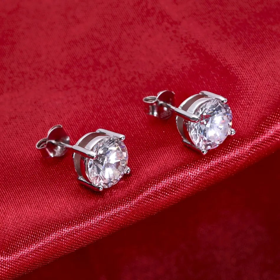 Round Four-Prong Moissanite Stud Earrings in Sterling Silver — Post backs