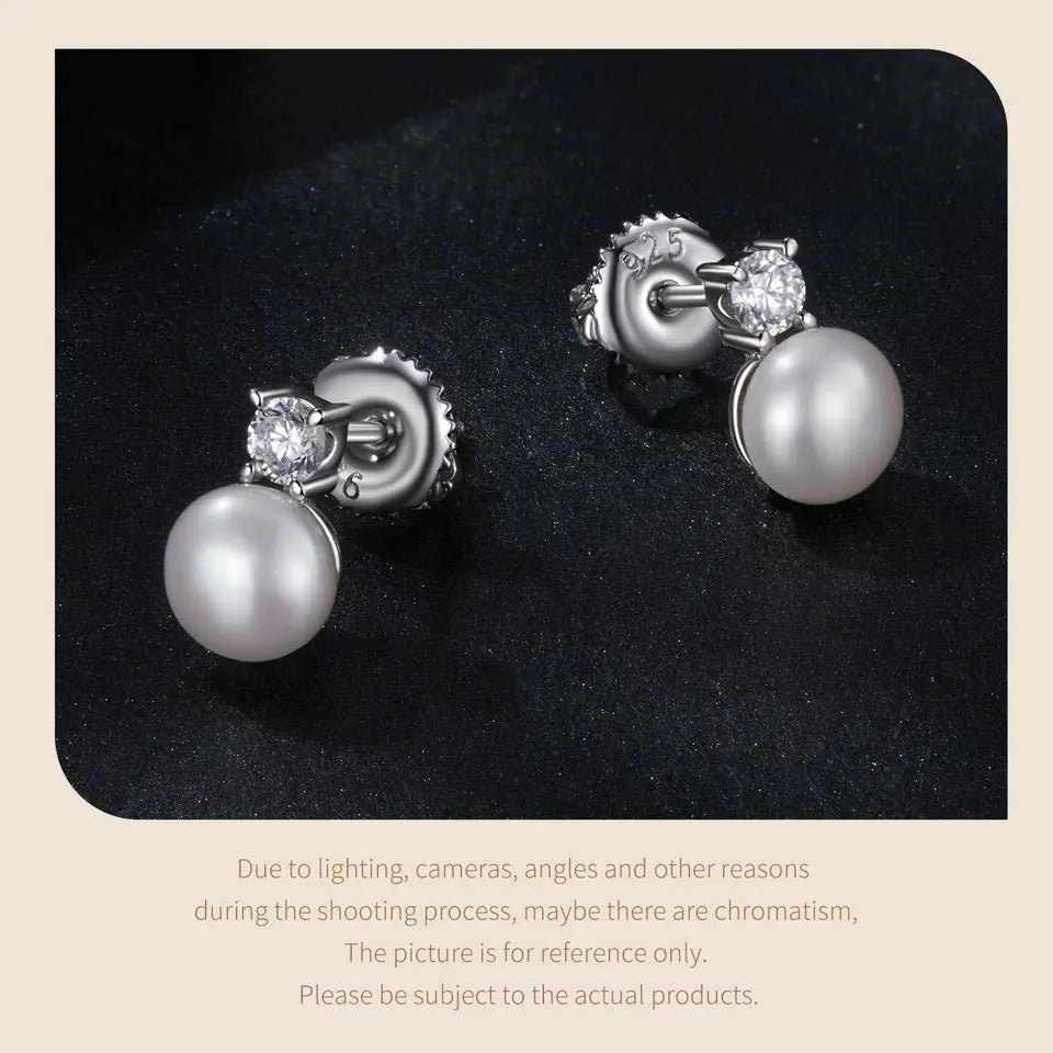 Freshwater Pearl & Moissanite Stud Earrings - large pearl close-up