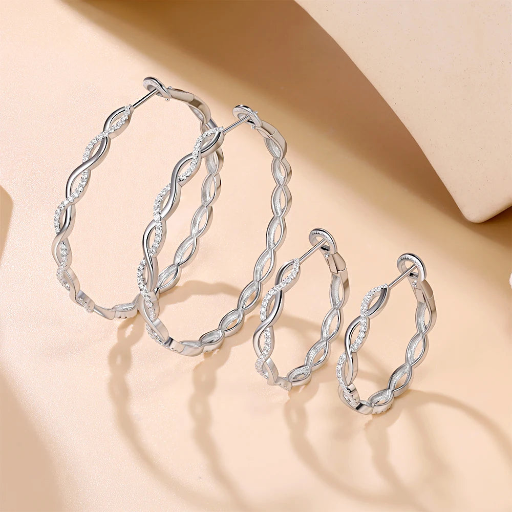 Twisted Infinity Moissanite Hoop Earrings in Sterling Silver — Two hoop sizes compared