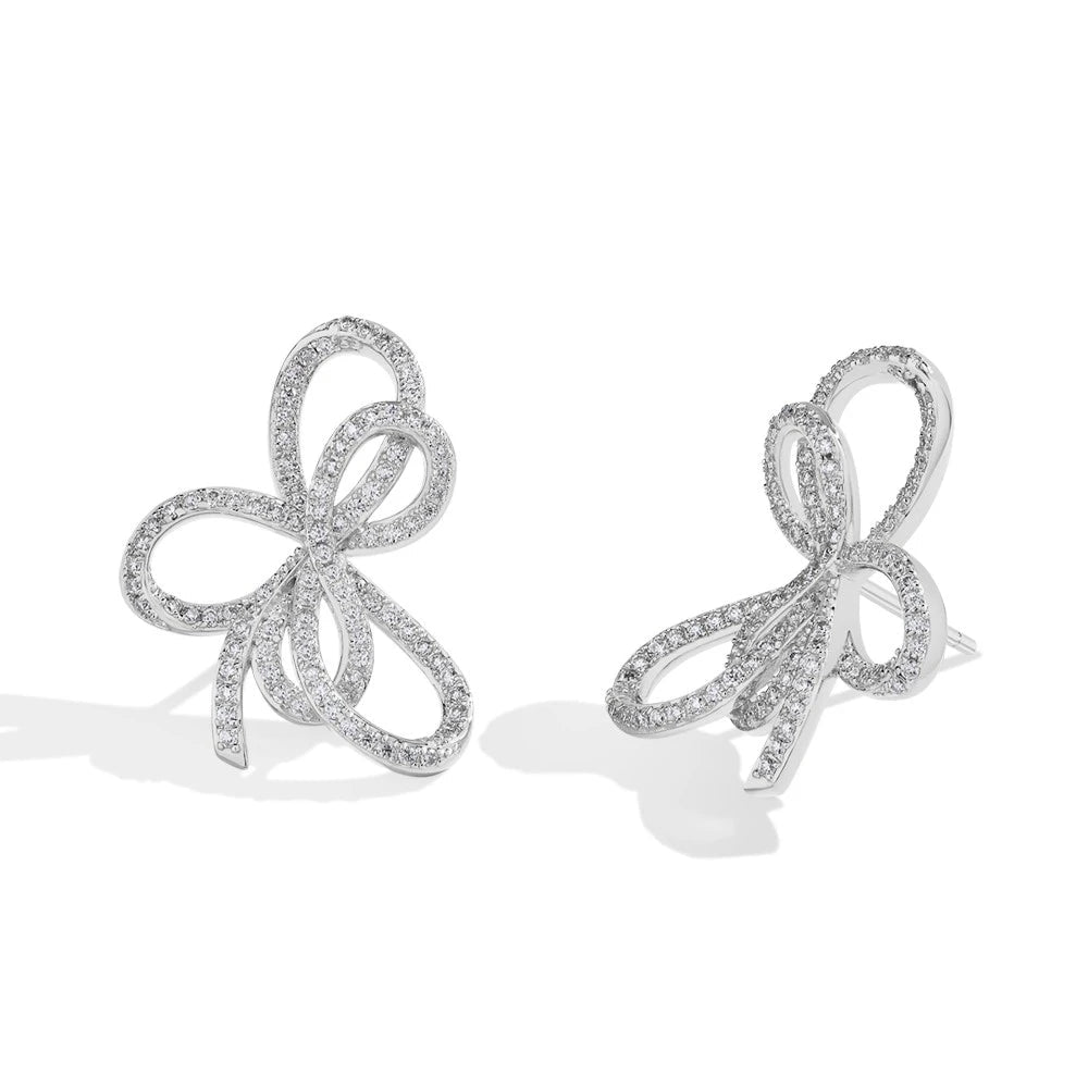 Open Bow Moissanite Stud Earrings in 925 Sterling Silver — Silver bow pair