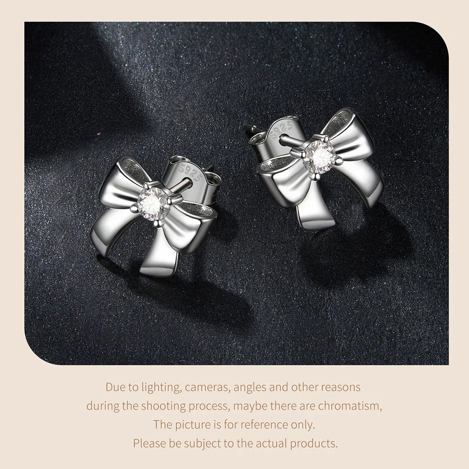Moissanite Bow Stud Earrings & Ear Cuffs in Sterling Silver — Bow stud angled pair