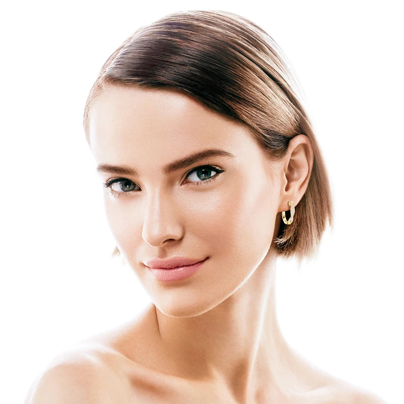 Twist Moissanite Hoop Earrings in 925 Sterling Silver — Shown on ear