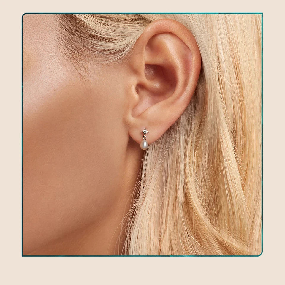 Moissanite Pearl-Effect Drop Stud Earrings in Sterling Silver — Drop studs worn on the ear