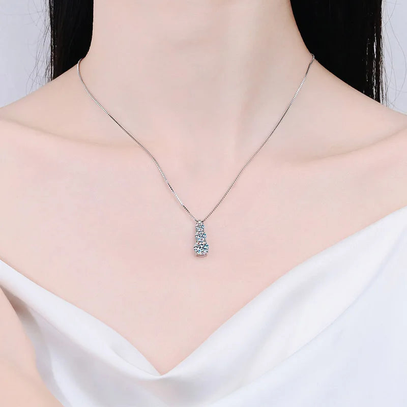 Graduated Moissanite Necklace, Drop Earrings & Ring Set - Pendant on model