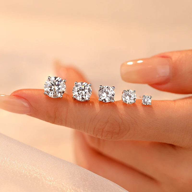 Black & White Moissanite Four-Prong Stud Earrings - stud sizes held for scale